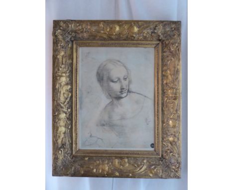 A pair of portrait prints in gilt frames, charcoal studies of drawings after Leonardo da Vinci