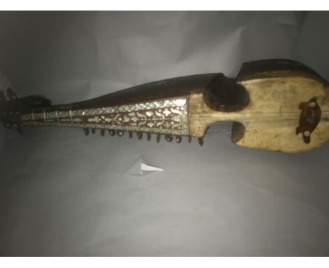 Short-necked lute (robab, rabab), Afghanistan, 19th century. Body and neck carved from a single piece of mulberry wood. Lower