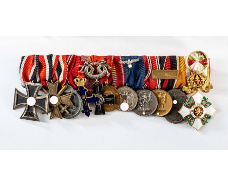 Große Ordensspange mit 11 Auszeichnungen: Eisernes Kreuz 2. Klasse 1939, Kriegsverdienstkreuz 2. Klasse mit Schwertern, Medai