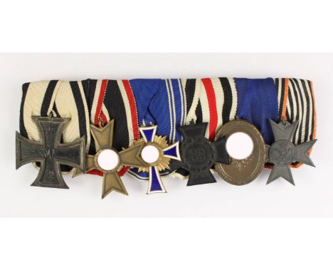 Große Ordensspange mit 6 Auszeichnungen: Eisernes Kreuz 1914 2. Klasse am Band für Nichtkämpfer, Kriegsverdienstreuz 1939 2. 