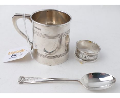 Silver hallmarked christening spoon and mug monogrammed EAG and silver napkin ring, total weight approx 133 grams 