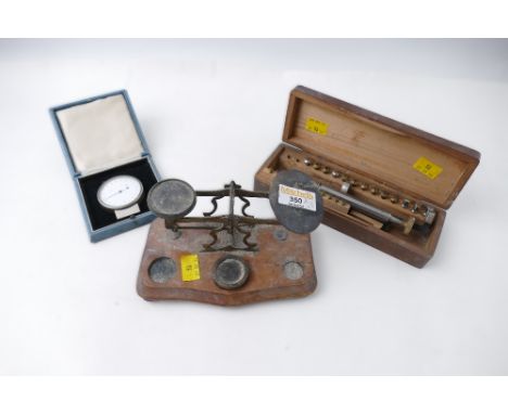 Small antique balance scales, boxed spherometer and boxed watchmakers screw head polishing lathe