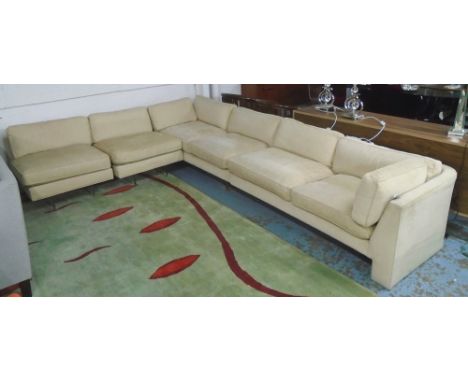 OMNIBUS SECTIONAL SOFA, by Vladimir Kagan, circa 1970's in neutral fabric with statement acrylic panel supports, 247cm x 346c