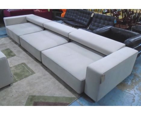 B&B ITALIA SOFA, three seater, in neutral fabric with hinged backs on tubular supports, 406cm L (bolted in three sections).