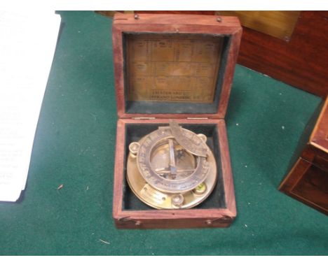 A boxed nautical compass
