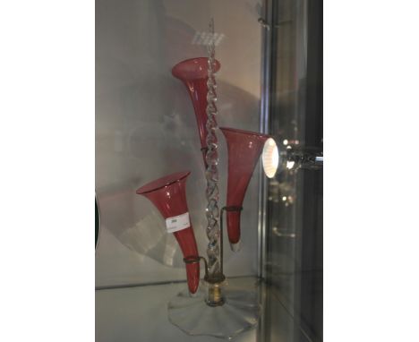 A 19th century epergne with three ruby trumpets
