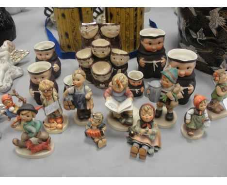 A collection of Hummel figures together with a quantity of Goebel monk figures