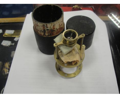 A boxed early 19th century brass botanist's microscope and tools