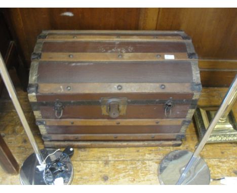A wood and leather-bound trunk