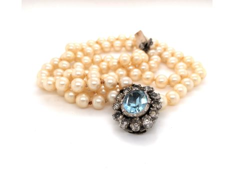 A VINTAGE DOUBLE STRAND PEARL NECKLACE COMPLETE WITH A SILVER HALLMARKED PASTE SET CLASP. LENGTH 34cms. 