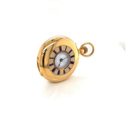 AN 18K STAMPED ANTIQUE GOLD AND ENAMEL DEMI HALF HUNTER SMALL POCKET WATCH. THE REVERSE WITH BLUE ENAMELLED MONOGRAMMED INITI