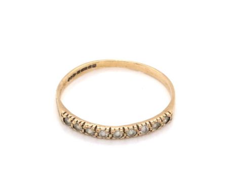 A VINTAGE 9ct YELLOW HALLMARKED GOLD AND NINE STONE CUBIC ZIRCONIA HALF ETERNITY RING. FINGER SIZE P 1/2. WEIGHT 0.93grms. 