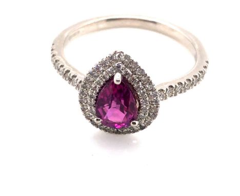 A PLATINUM 950 HALLMARKED TEARDROP PINK SAPPHIRE AND DIAMOND HALO SET RING. THE PINK SAPPHIRE 6.5 x 5.0mm, APPROX DEPTH 3mm, 