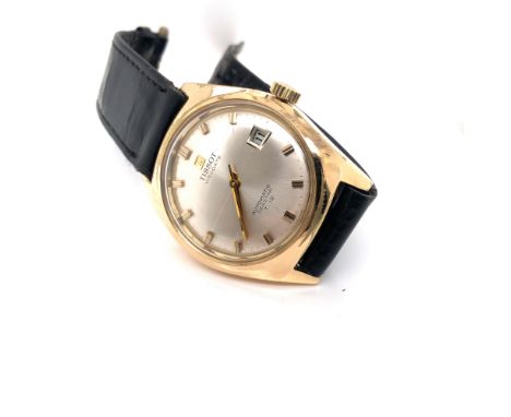 A VINTAGE GENTLEMAN'S TISSOT AUTOMATIC SEASTAR T.12 VISODATE WRIST WATCH, ON A REPLACEMENT LEATHER STRAP WITH A SILVERED DIAL