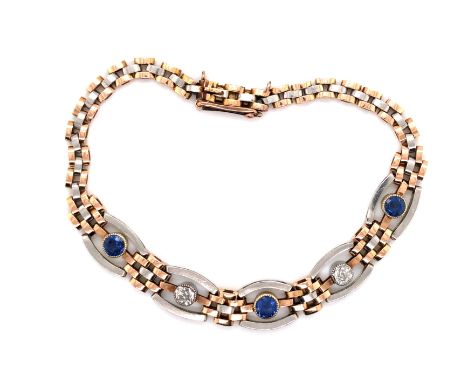 A VINTAGE SAPPHIRE AND DIAMOND GATE STYLE BRACELET. THE THREE SAPPHIRES AND TWO DIAMONDS ALL OLD CUT IN RUB OVER SETTINGS. OL