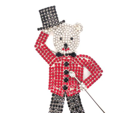 A LARGE VINTAGE SIGNED BUTLER AND WILSON RHINESTONE TAP DANCING BEAR BROOCH WITH TOP HAT AND CANE. LENGTH 14.5cms. 