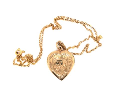 A VINTAGE 9ct YELLOW GOLD HALLMARKED HEART SHAPED PORTRAIT LOCKET, SUSPENDED ON A 9ct STAMPED TRACE CHAIN. LOCKET DROP 2cms, 