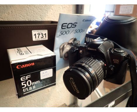 Canon EOS 500 film camera body and Canon EF 28-80 1:3.5-5.6 II lens and Canon EF 50mm f/1.8 lens