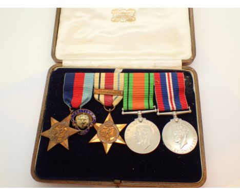 Four WWII medals with bar 1st Army and British Legion badge medal