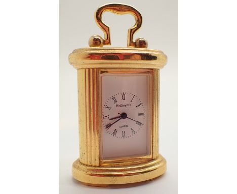 Miniature brass carriage clock