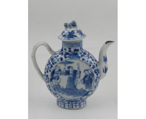 A Chinese blue and white porcelain teapot, decorated with vignettes of musicians and attendants, amongst scrolling foliage, t