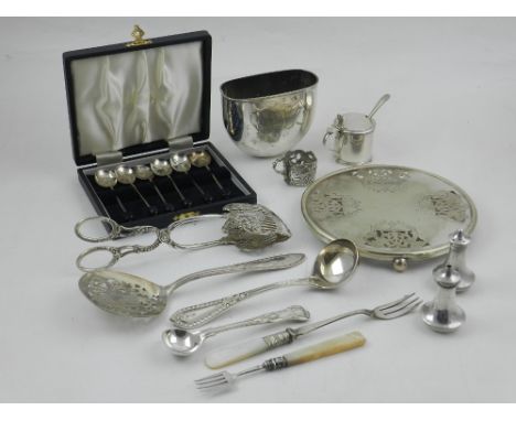 A George VI silver mustard pot together with blue glass liner and silver plated spoon, a silver salt and pepper, a set of six