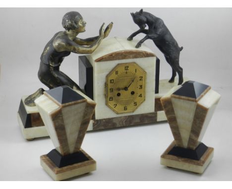 Art Deco marble and figural mounted mantel clock with garnitures, the clock of stepped form and mounted with a young woman an