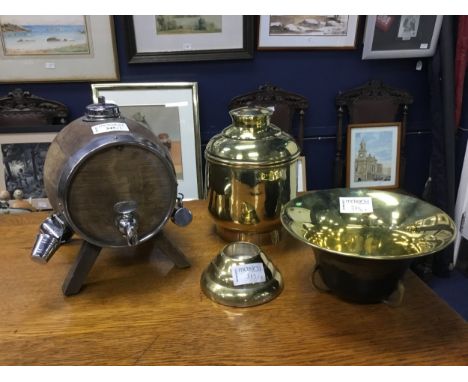 BRASS HAMMERED TEA CADDY, along with a whisky dispenser modelled as a keg, and other brass items (4)