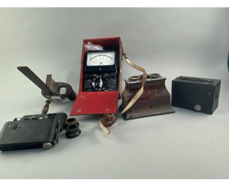 TWO EARLY 20TH CENTURY STEREOSCOPIC VIEWERS, along with a TMK model 700 volt meter in leather case, a box Brownie camera and 