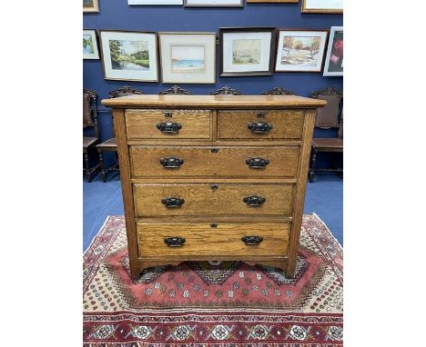 EDWARDIAN OAK CHEST OF DRAWERS with two short and three long graduated drawers, on bracket feet, 102cm wide