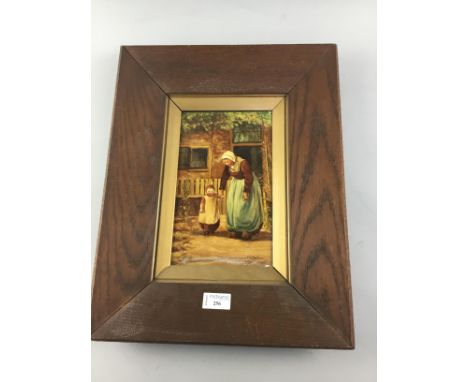 19TH CENTURY HAND PAINTED CERAMIC PANEL, decorated with a mother and child, signed H. Valkenberg, 25cm x 15cm, framed