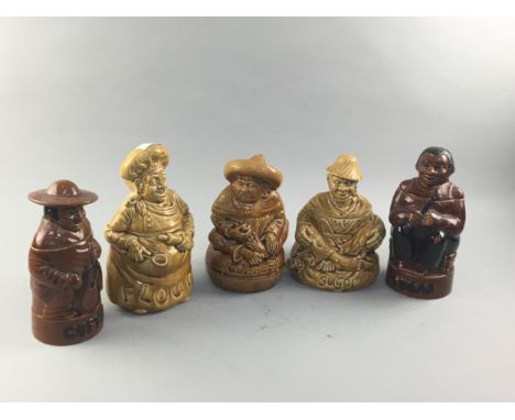 FIVE CERAMIC NOVELTY PANTRY JARS, modelled as men, comprising two coffee, two sugar, one flour, the tallest 26cm high