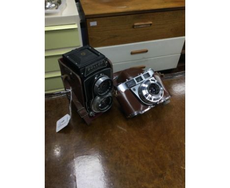 ROLLOP AUTOMATIC TWIN LENS REFLEX CAMERA, along with a Kodak Retinette IB camera, in leatherette cases (2)