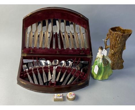 CANTEEN OF&nbsp;STAINLESS STEEL CUTLERY, 45cm wide, along with a Royal Doulton figure of 'Fleur', HN 2368, 19cm high, a Sylva