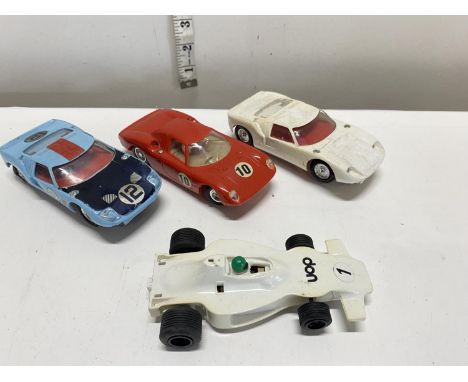 Four assorted vintage slot cars