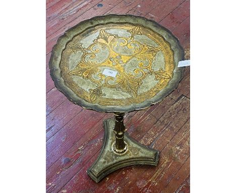 A vintage wooden wine table with gilt inlay  shipping unavailable.