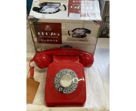 A boxed as new vintage style push button telephone