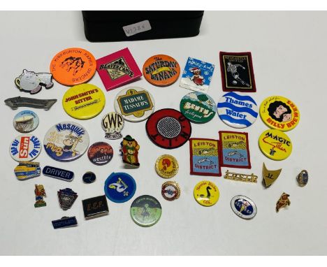 A job lot of assorted vintage pin badges