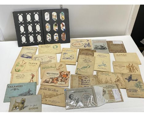 A job lot of assorted vintage cigarette card albums (look to be all complete)