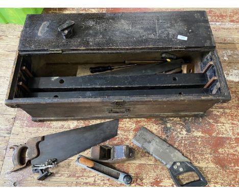 A antique tool chest with handsaws, planes, files etc, shipping unavailable