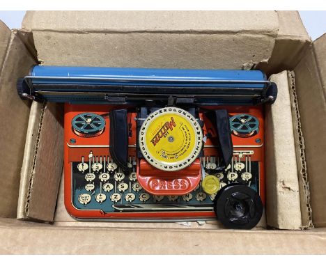 A vintage Met Type Junior typewriter in original box