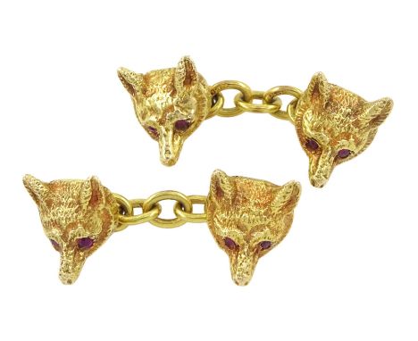 Pair of 9ct gold fox head cufflinks, set with ruby eyes, London 1967Condition Report:Approx 9.95gm, head diameter = 9.4mm, go