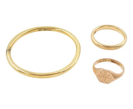 9ct rose gold signet ring, Birmingham 1915, 9ct rose gold wedding ring, Birmingham 1933 and a gold child's bangle, stamped 15