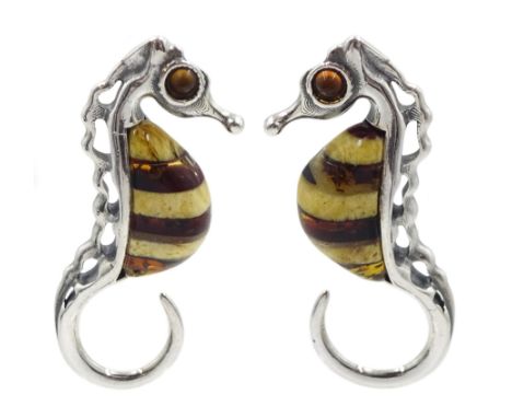 Pair of silver Baltic amber seahorse stud earrings, stamped 925Condition Report:Length = 27mm, good condition