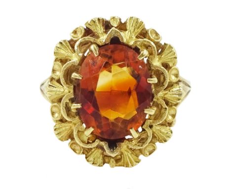 18ct gold single stone oval citrine ring, with fancy surround, London import mark 1969Condition Report:Approx 5.05gm, size J,