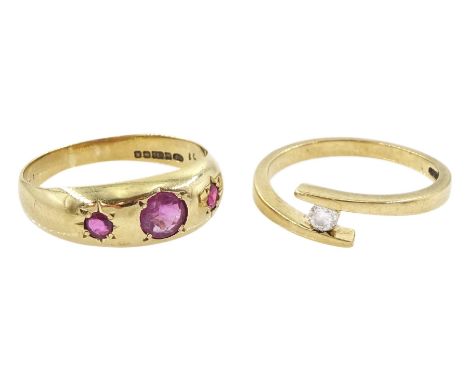 Gold single stone diamond ring and a gold three stone ruby ring, both hallmarked 9ctCondition Report:Approx 5.3gm, diamond ri