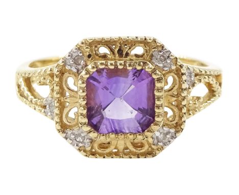 9ct gold cushion cut amethyst and diamond chip ring, with pierced design surround and shoulders, hallmarkedCondition Report:A