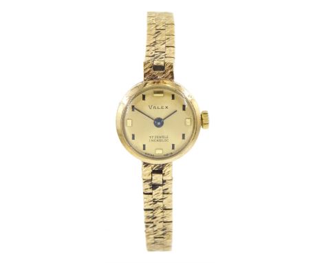 Velex ladies 9ct gold manual wind wristwatch, on integral 9ct gold textured brick link bracelet strap, London 1967Condition R