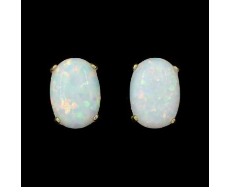 Pair of 9ct gold opal stud earrings, stampedCondition Report:Approx 0.5gm, head = 6mm x 4mm, good condition
