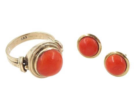 8ct gold single stone coral ring, stamped 333 and a matching pair of 8ct gold coral stud earringsCondition Report:Approx 7.65